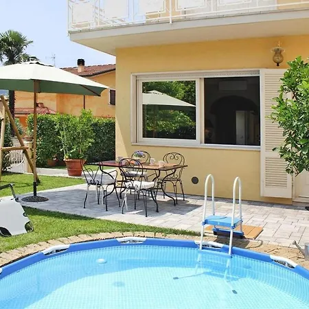 Villa With Above Ground Pool In